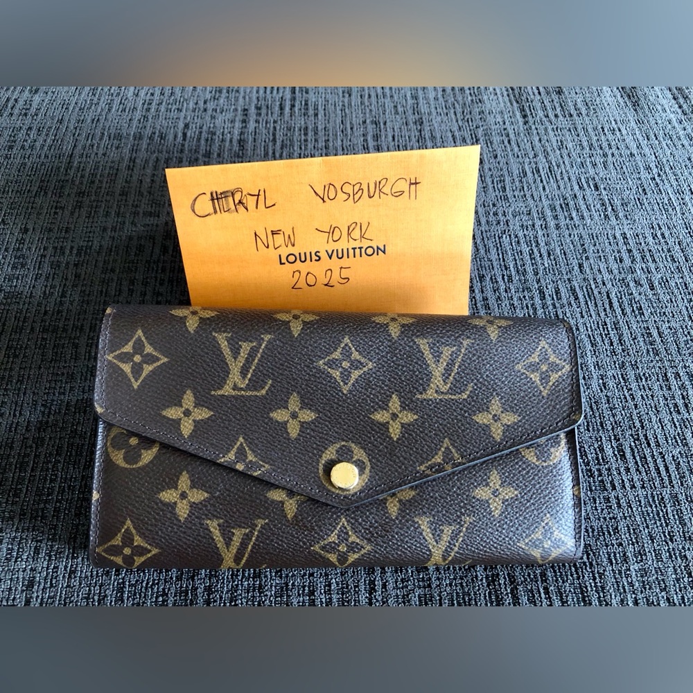Monogram Canvas Sarah NM Wallet with initials A.T.